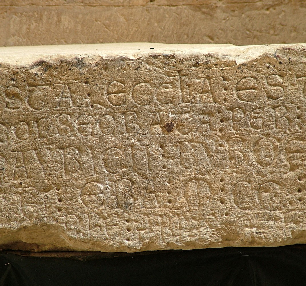 Ashlar with inscription of consecration